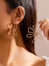 Moda Metal Parlak Büyük Çiçek Küpe