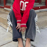 Düşük Bel Bol Yan Çizgili Fiyonklu Geniş Paça Kot Pantolon