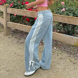 Düşük Bel Bol Yan Çizgili Fiyonklu Geniş Paça Kot Pantolon