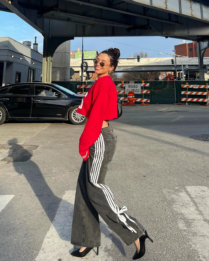 Düşük Bel Bol Yan Çizgili Fiyonklu Geniş Paça Kot Pantolon